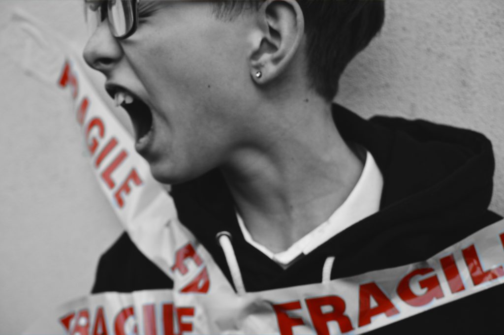 An image showing the impact of bullying on a teenager